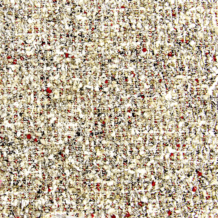Lanerie Grosber - Tweed & Bouclè​. Tessuti noti per la loro durata e calore, sono comunemente usati nella creazione di giacche, cappotti e gonne.